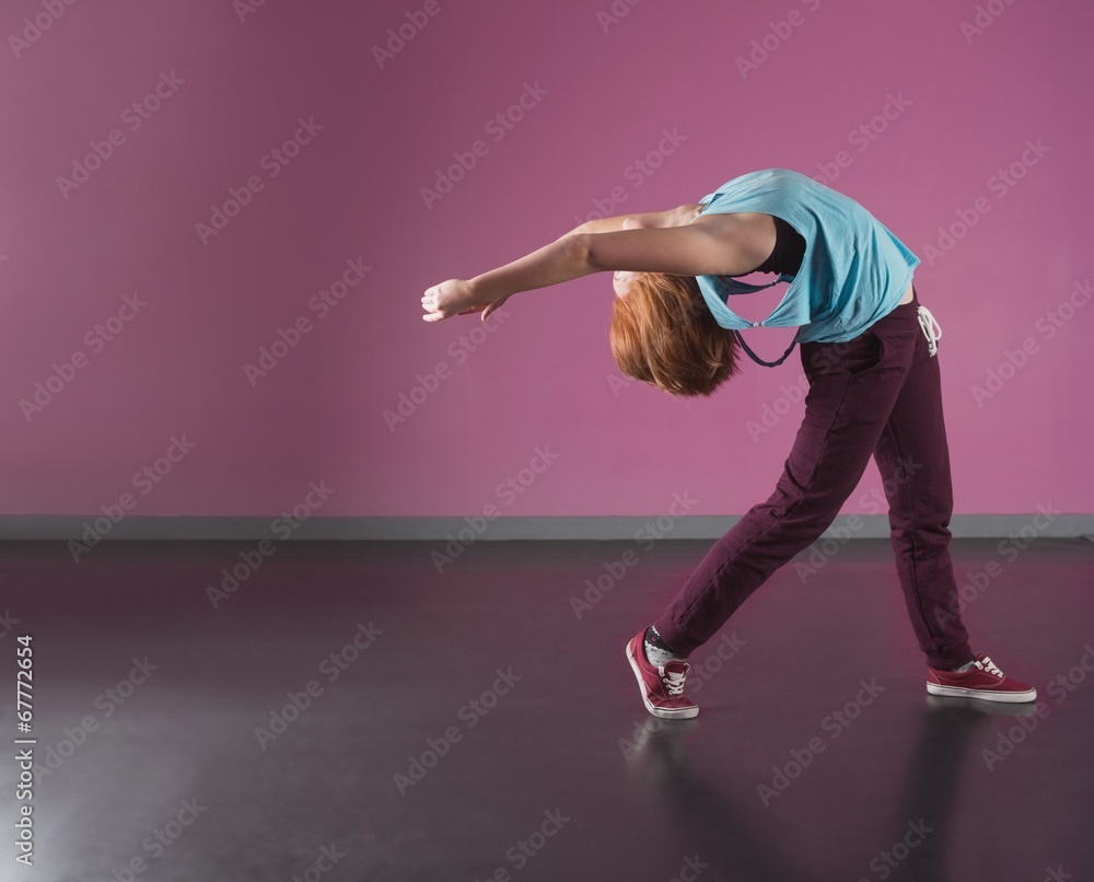 Pretty break dancer bending backwards