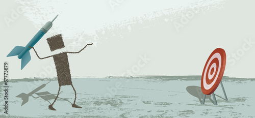 Aiming. A businessman pointing to the target