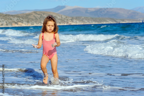 Toddler girl at beach © SuperCoolPhotography