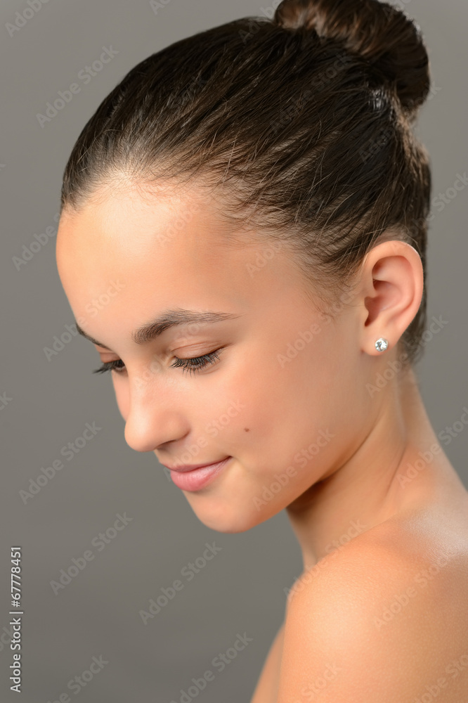 Teenage girl purity skin beauty looking down