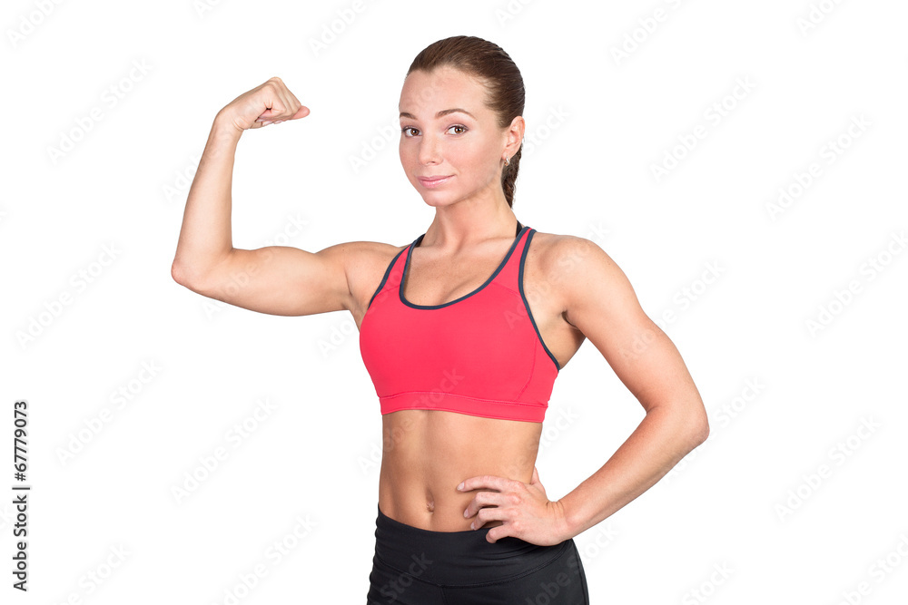 Sportive young woman showing muscles on hands Sportive young woman showing muscles on hands