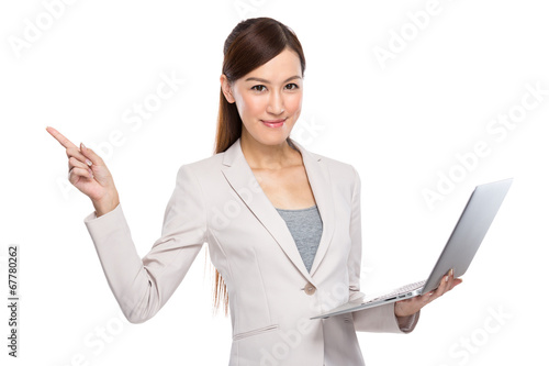 Asian Business Woman with laptop and fingerup photo