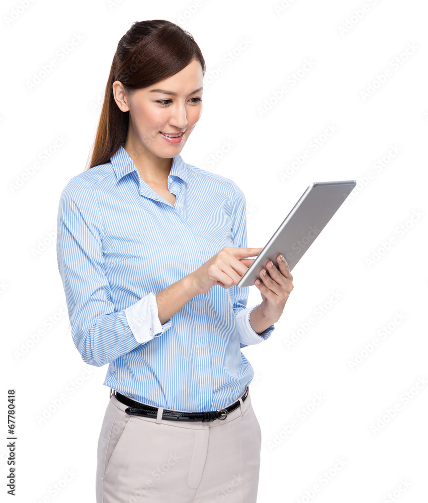 Young business woman using tablet on white background Young business woman using tablet on white background