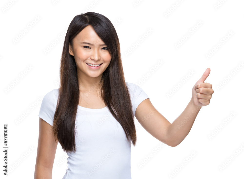 Young asian woman thumbs up on white background Young asian woman thumbs up on white background