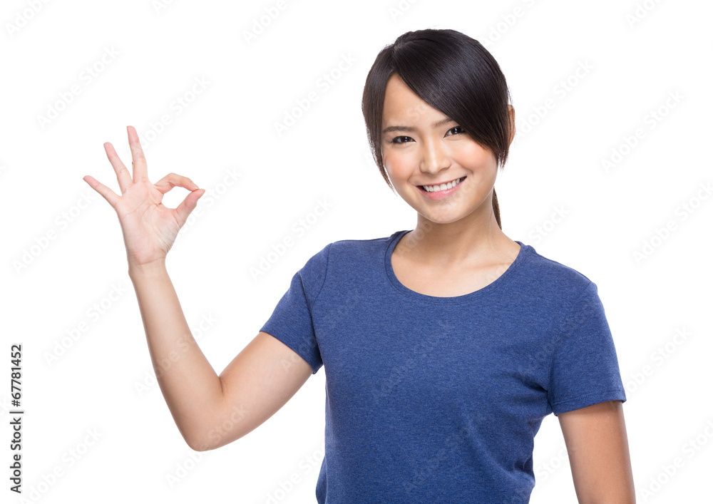 Young woman ok sign on white background Young woman ok sign on white background