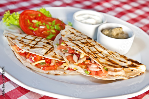 Barbecue chicken and cheddar quesadillas