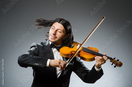 Man violin player in musican concept