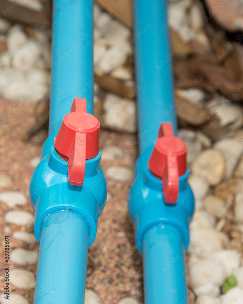 Blue PVC pipe and  valve