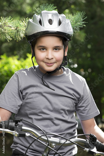 Portrait of a child riding bicycle