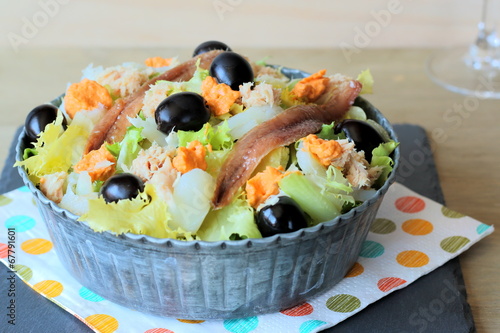 Escarole salad with anchovies, cod and tuna fish