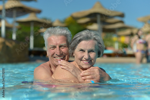 Elderly couple in pool © aletia2011