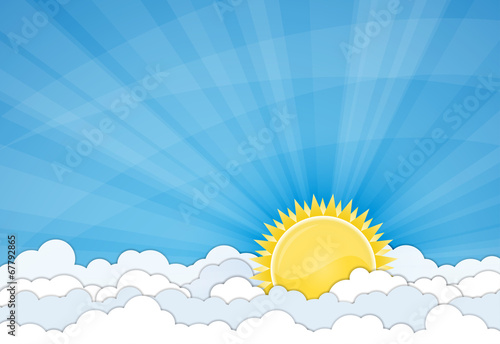 Sun and white clouds over blue sky