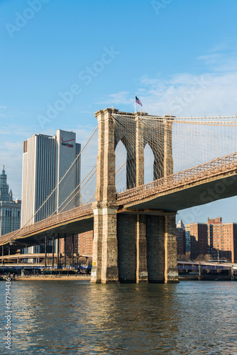 Brooklyn bridge in New York on bright summer day