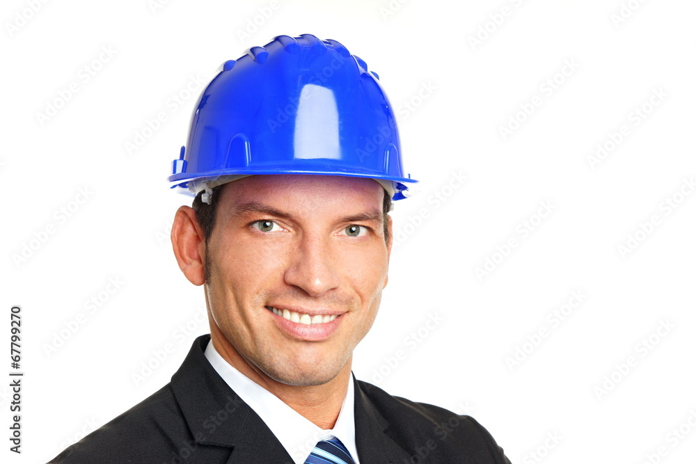 Portrait of handsome businessman in a protective helmet Portrait of handsome businessman in a protective helmet