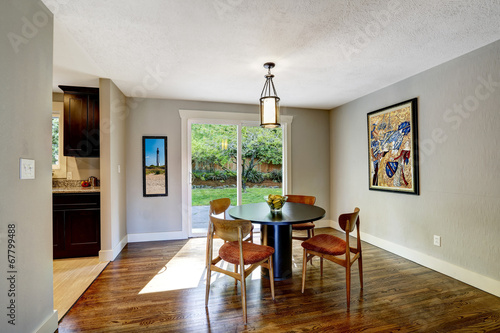 Dining area with walkout deck in new house
