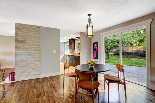 Dining area with walkout deck in new house