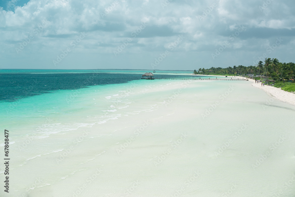 wide open view of white sand tropical beach nature background