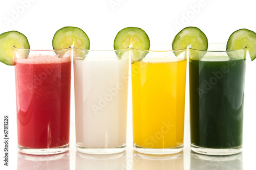 Colorful glasses of fruit and vegetable juice