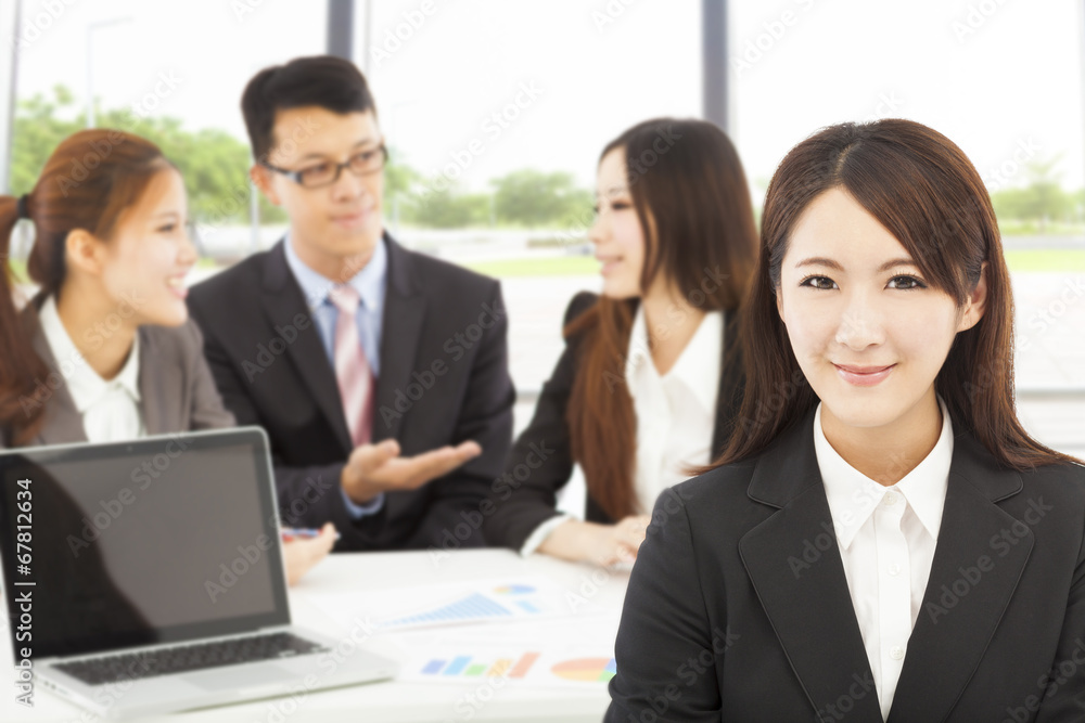 business female manager with teams in the office business female manager with teams in the office