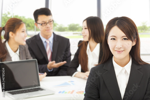 business female manager with teams in the office