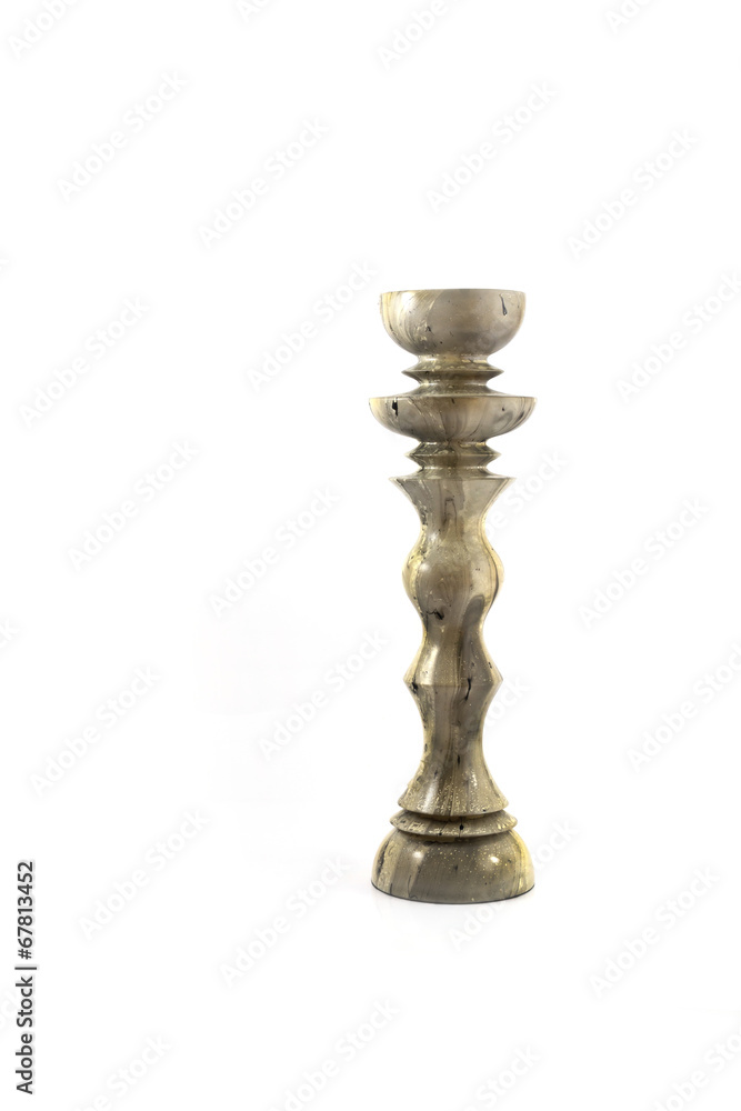 Old candlestick isolated on white background