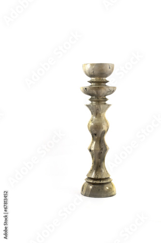 Old candlestick isolated on white background