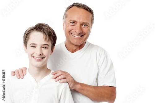 Happy father and son over white background
