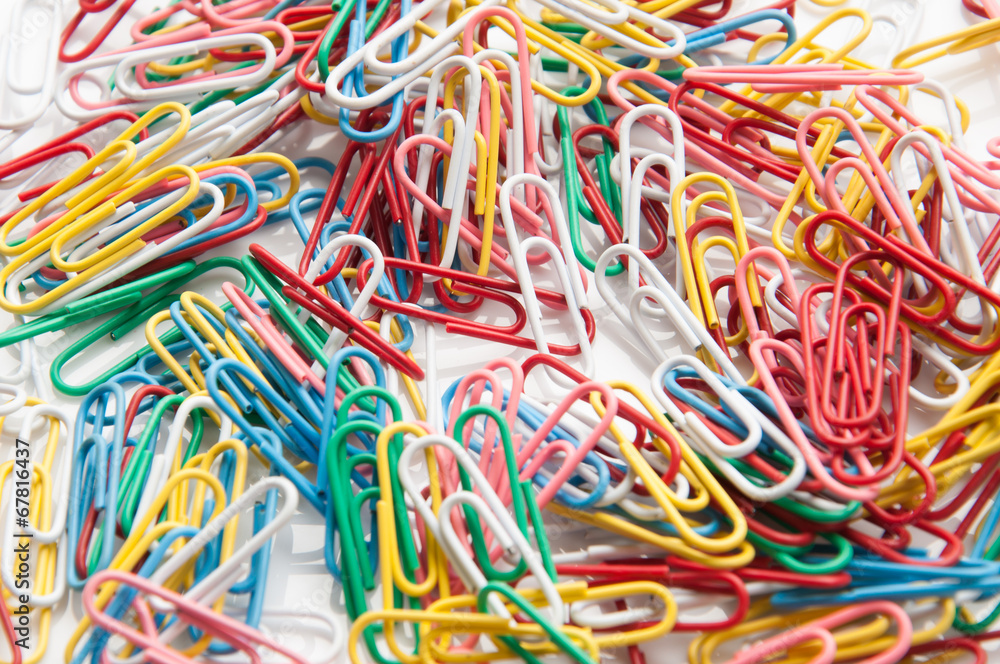 A colorful paper clip against a white background