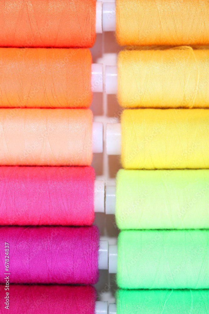 Multicolor sewing threads background Multicolor sewing threads background