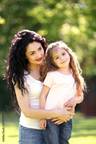 Happy mom and daughter. Wal...