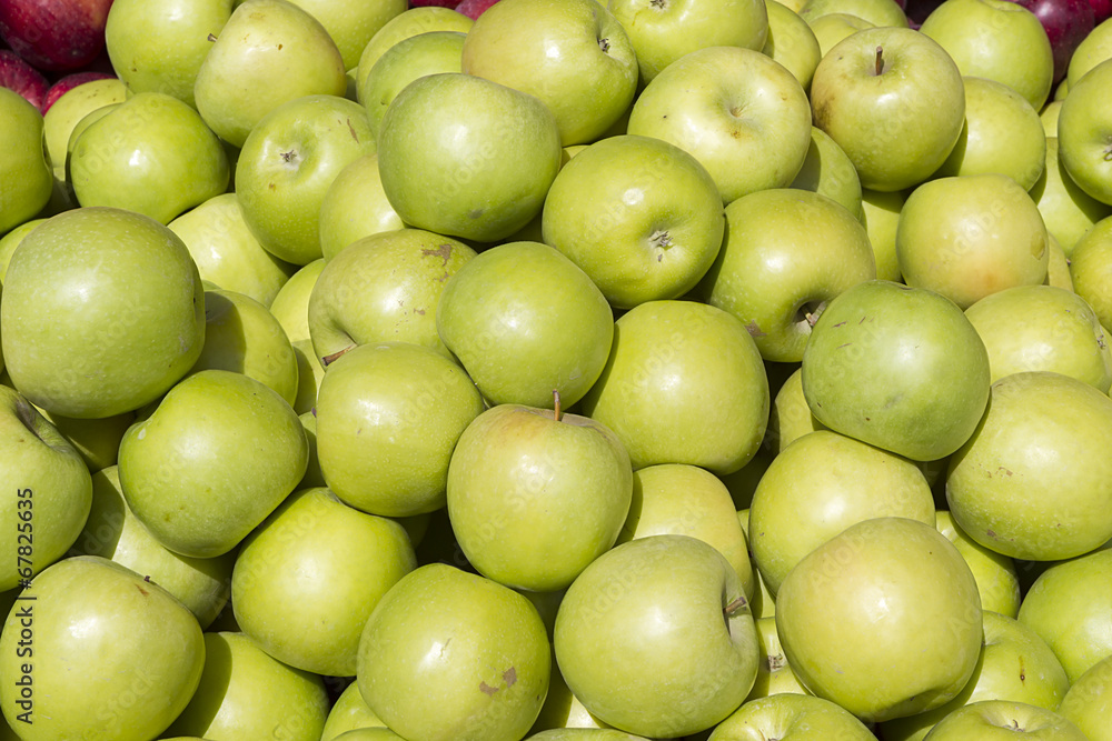 Many fresh green apple in a pile Many fresh green apple in a pile