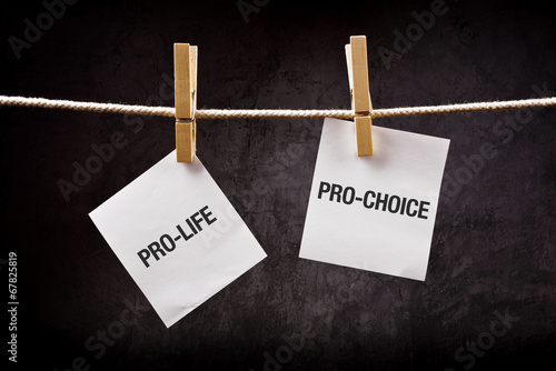 Pro-life vs pro-choice, abortion concept