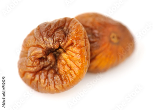 Dried figs on white background