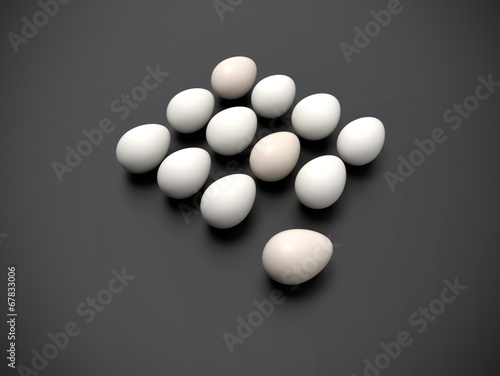 Dozen of eggs on dark grey background