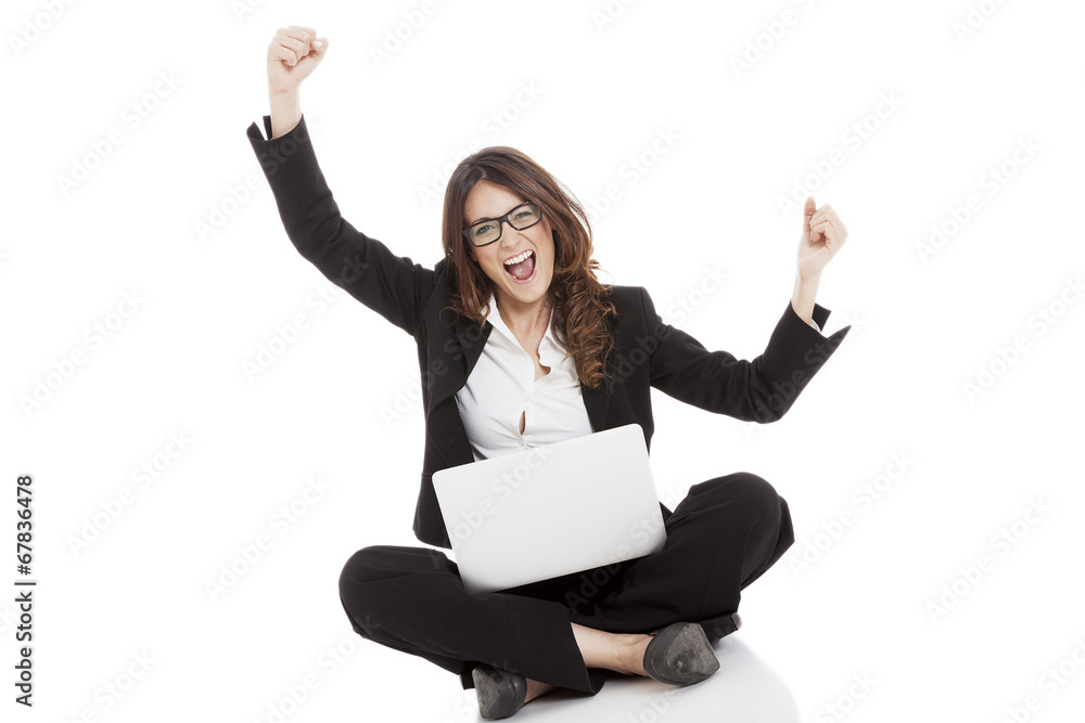 Excited woman with arms up winning online Excited woman with arms up winning online