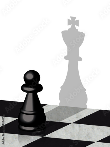 Pedina nera scacchi con ombra di re photo