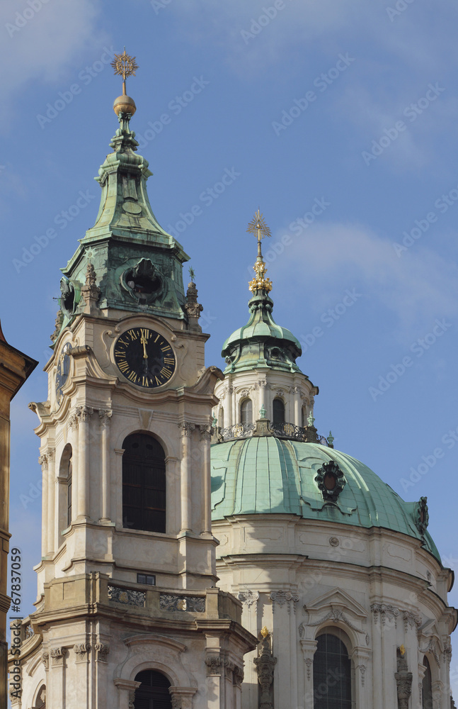 Belltower and temple dome. St. Mikulash's cathedral, Prague