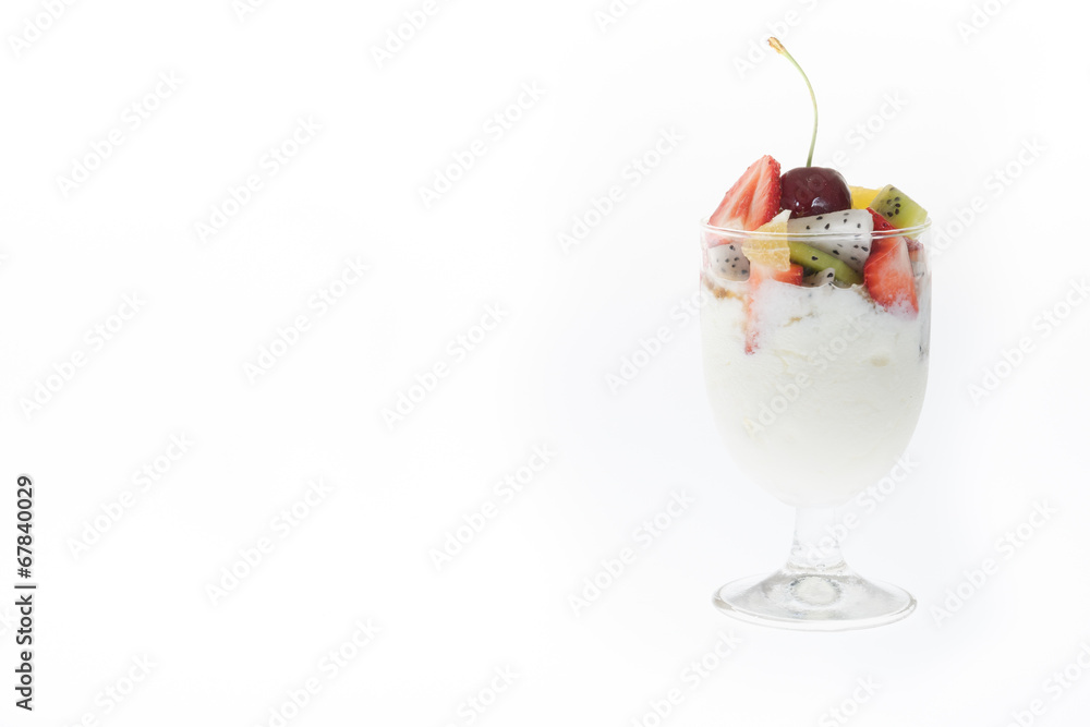 Yogurt with fresh fruits salad on top in wine glass and berries, Yogurt with fresh fruits salad on top in wine glass and berries,