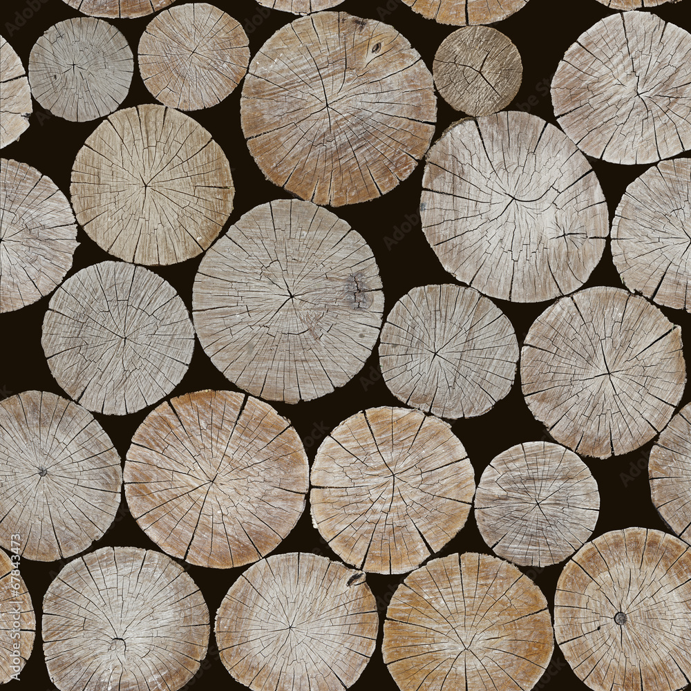 Fototapeta premium The background of logs. Seamless image