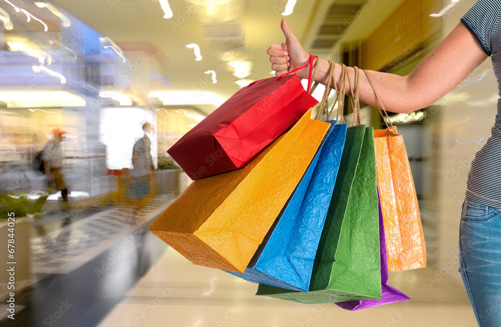 Female holding shopping bags