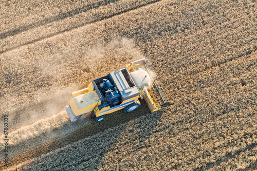 aerial view of combine on harvest field © mariusz szczygieł