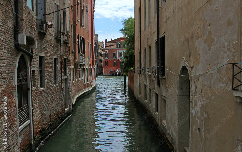 narrow navigable  channel of water in the splendid city of Venic