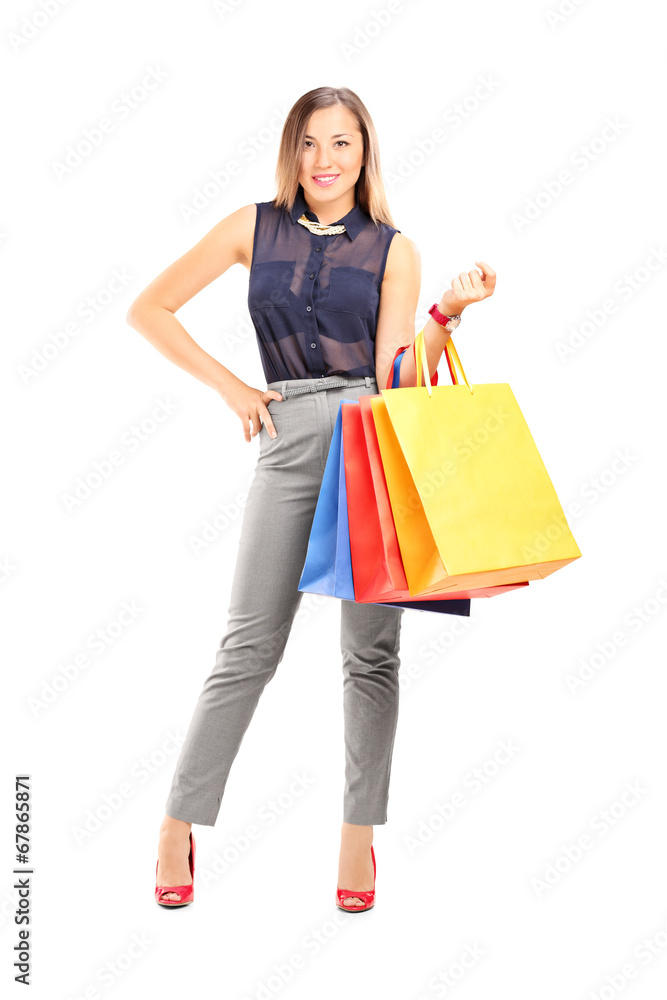 Trendy girl holding shopping bags Trendy girl holding shopping bags
