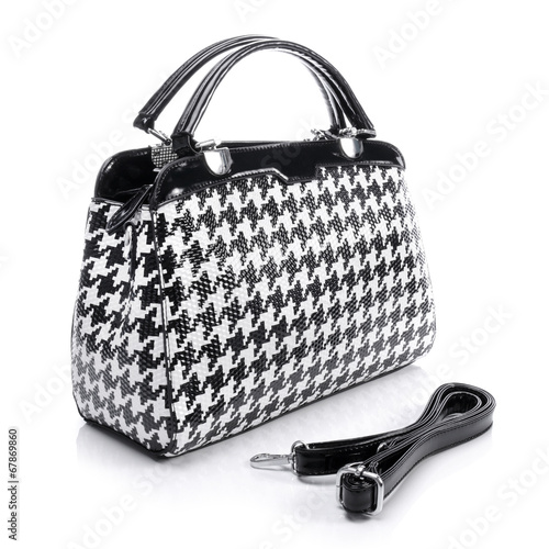 Handbag in white and black on white background