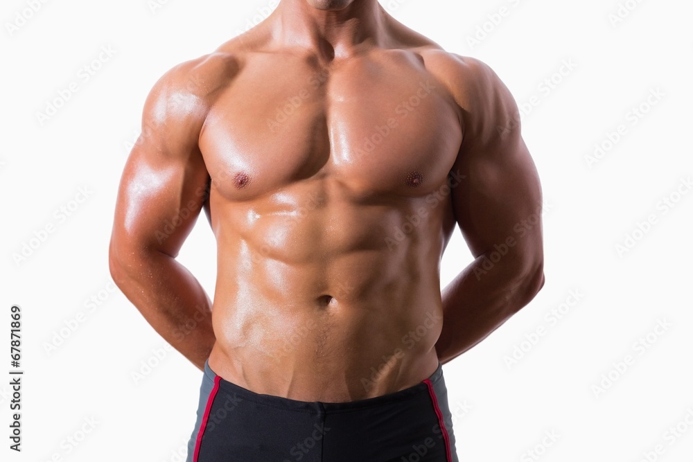 Mid section of shirtless muscular man Mid section of shirtless muscular man