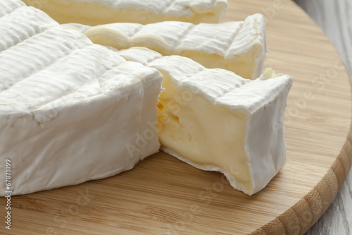 Fresh Brie cheese photo
