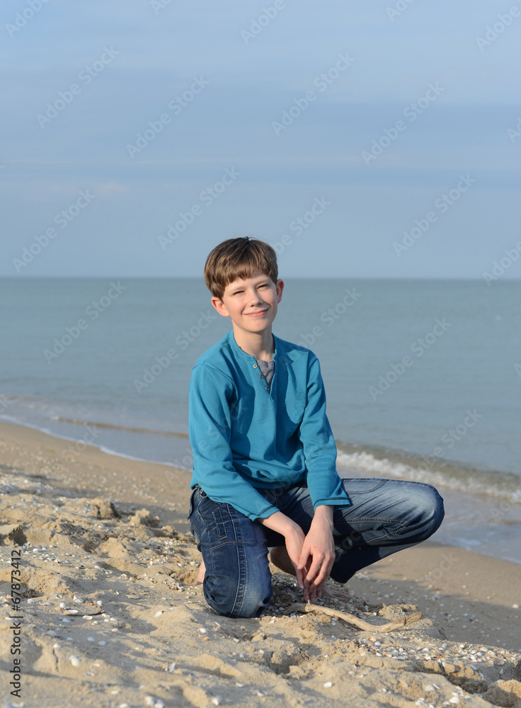Boy on a sandy beach