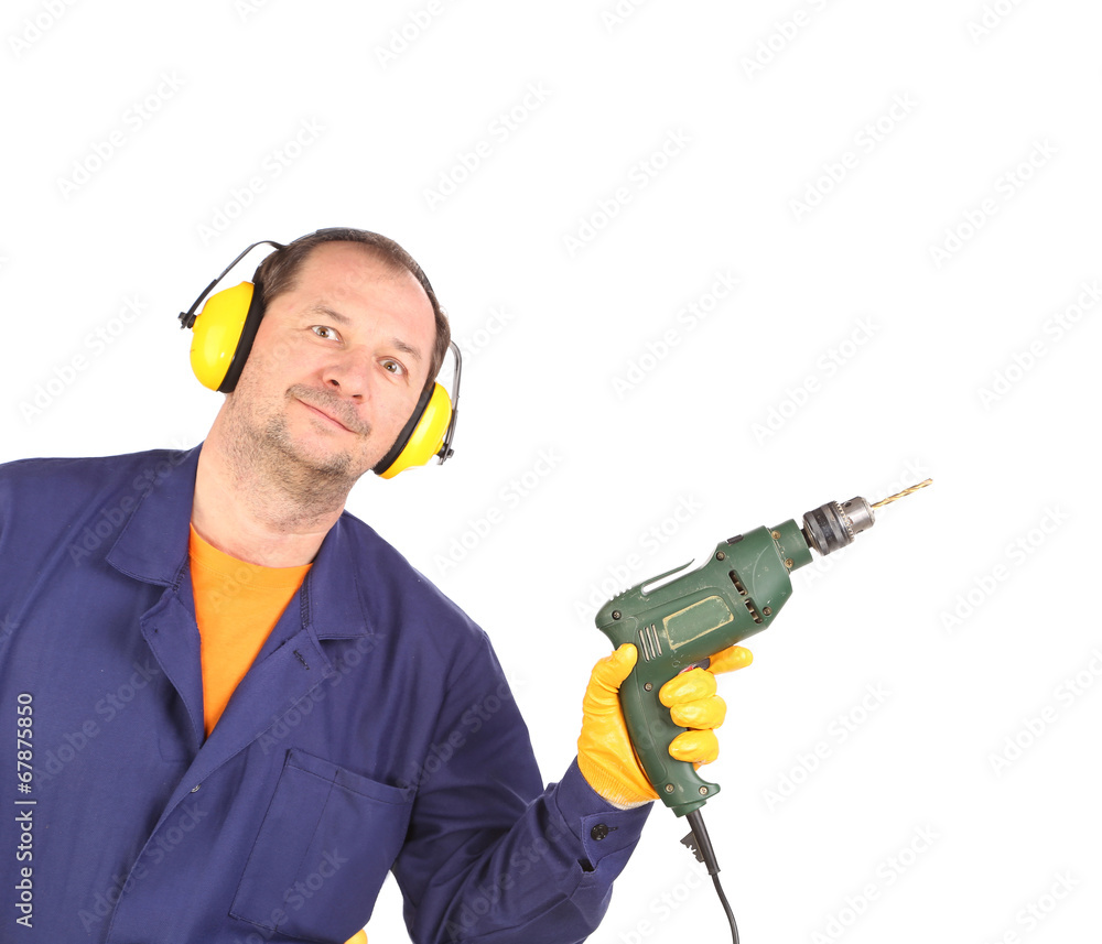 Worker with drill. Worker with drill.