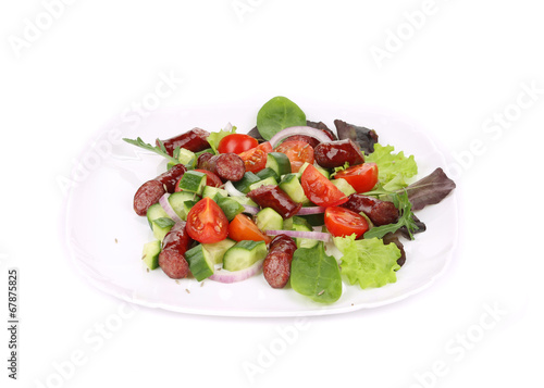 Fresh salad with sausage.