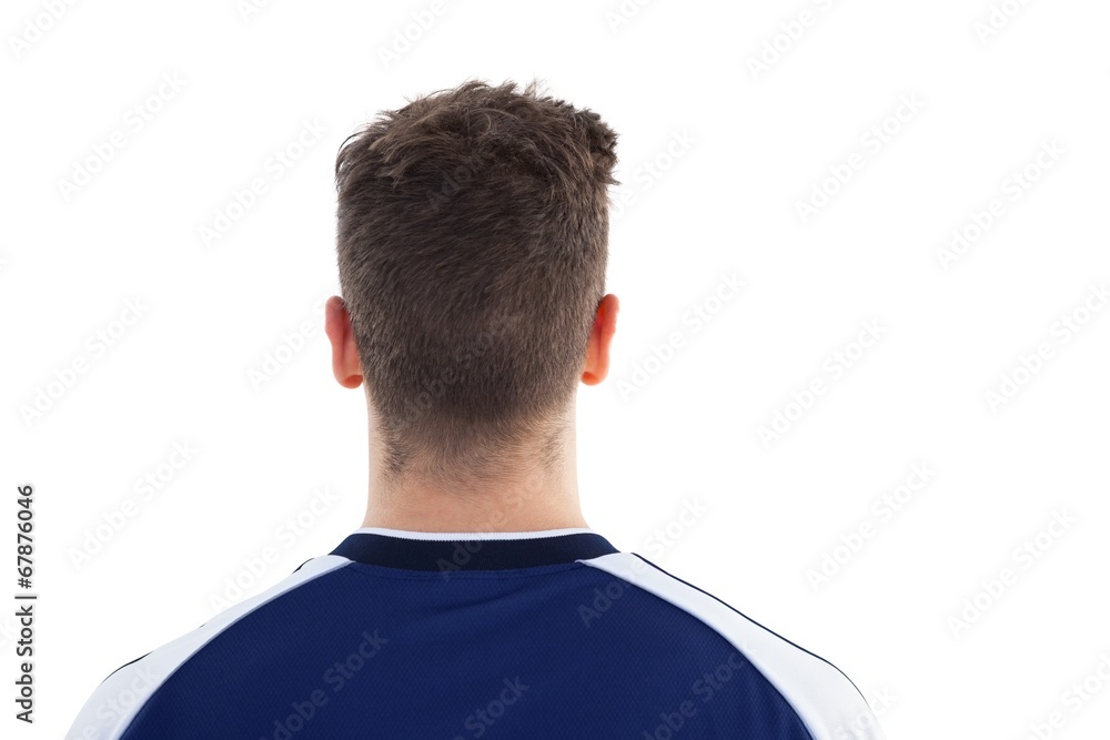 Football player in blue jersey Football player in blue jersey
